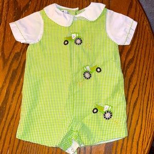 Size 6 month gingham onesie for boys. Worn once. Like brand new.